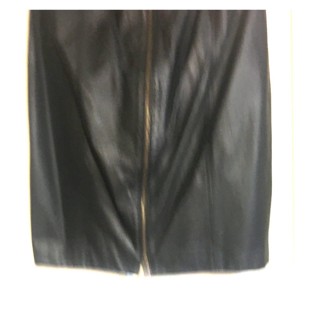 100% Black leather skirt, zips up the front